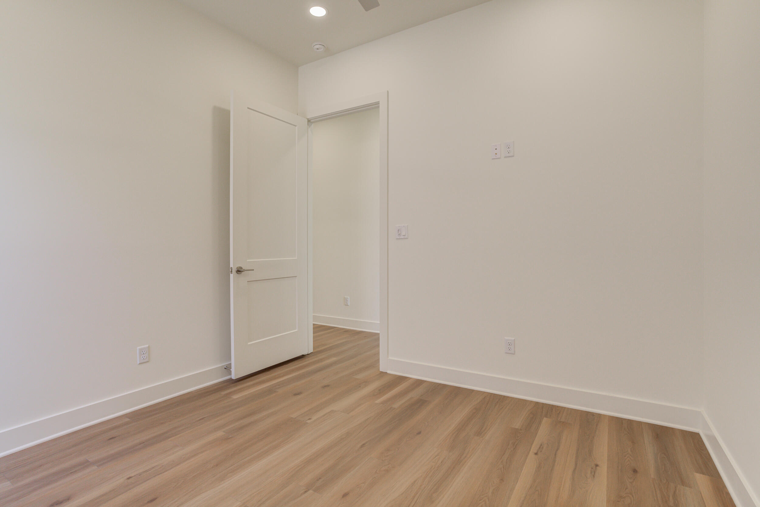 4610 138th Place Lubbock, TX 79424 - Photo 45 of 52 a view of an empty room with wooden floor