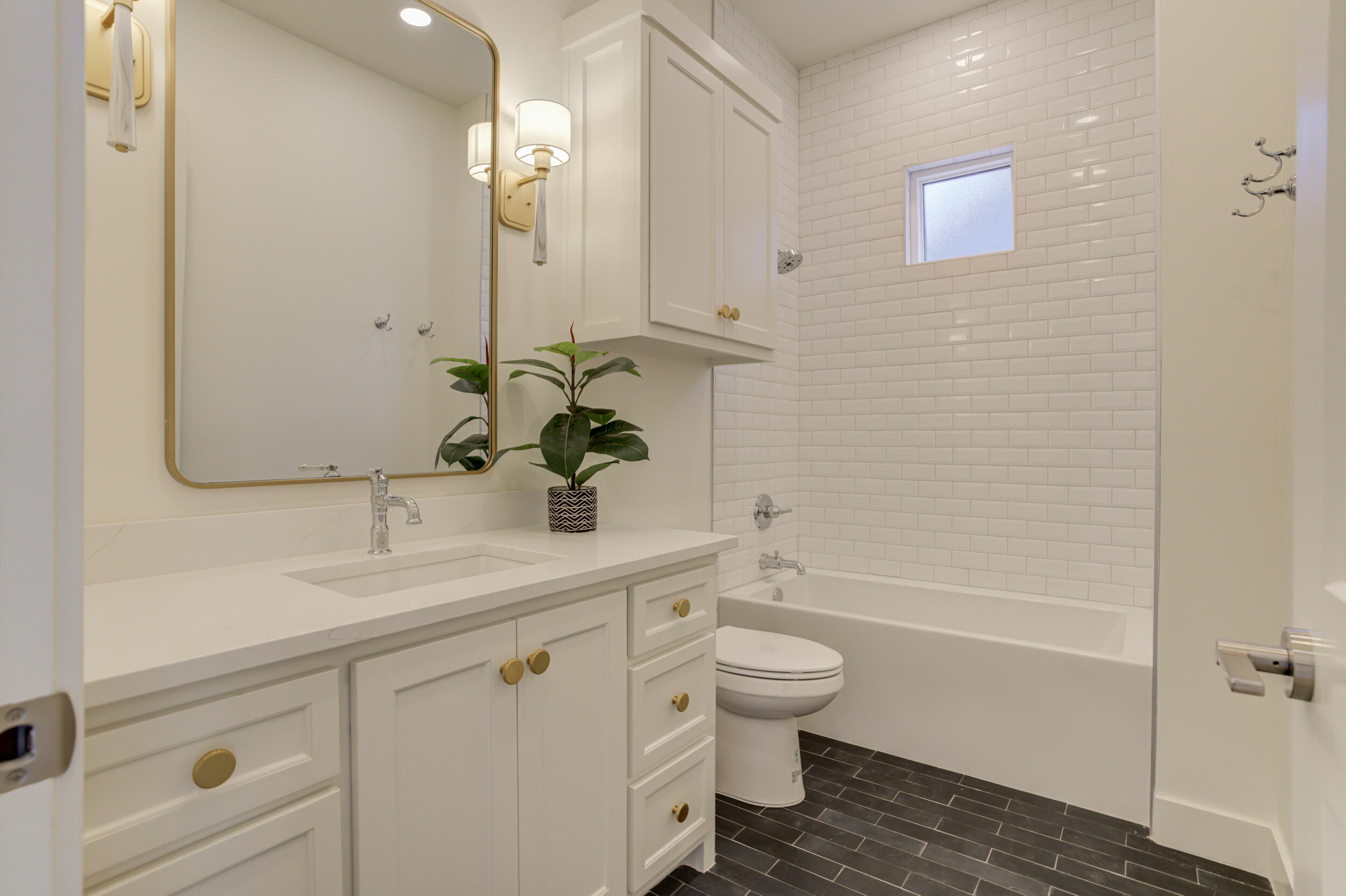 4610 138th Place Lubbock, TX 79424 - Photo 46 of 52 a bathroom with a sink toilet tub and shower