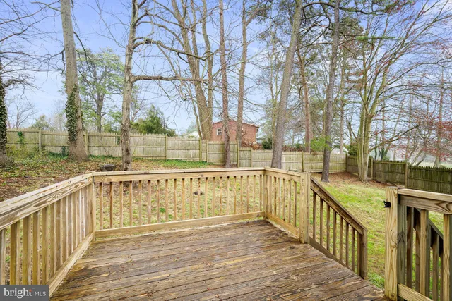 a view of a lake with wooden stairs
