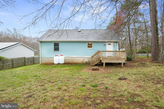 a house view with a backyard space