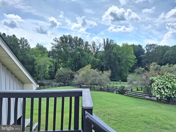 a view of a balcony with city view