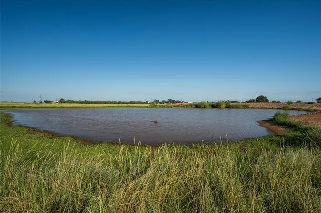a view of a lake with outdoor space
