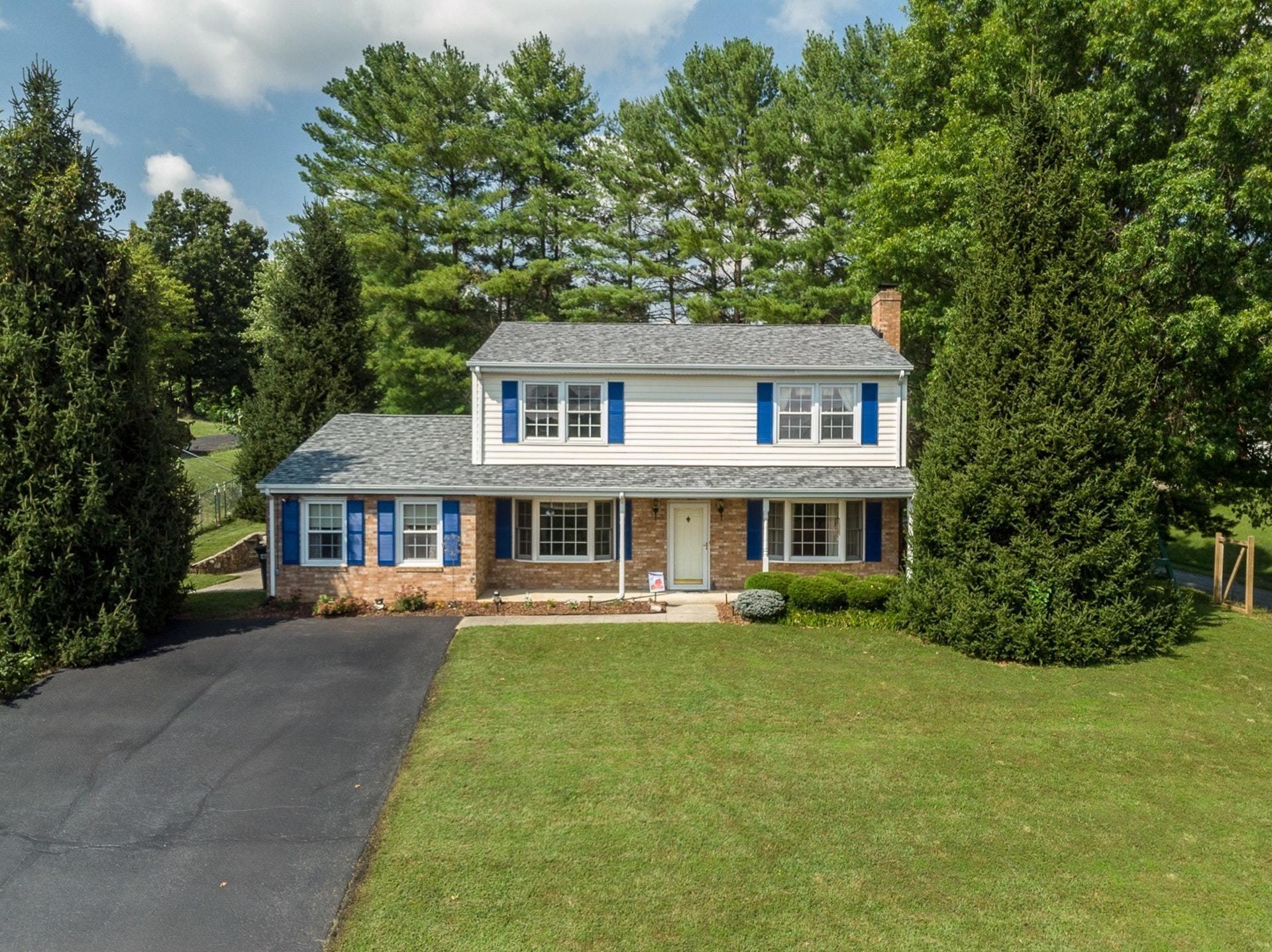 206 Ridgeview Road Blue Ridge, VA 24064 - Photo 1 of 44 a front view of a house with a yard and trees
