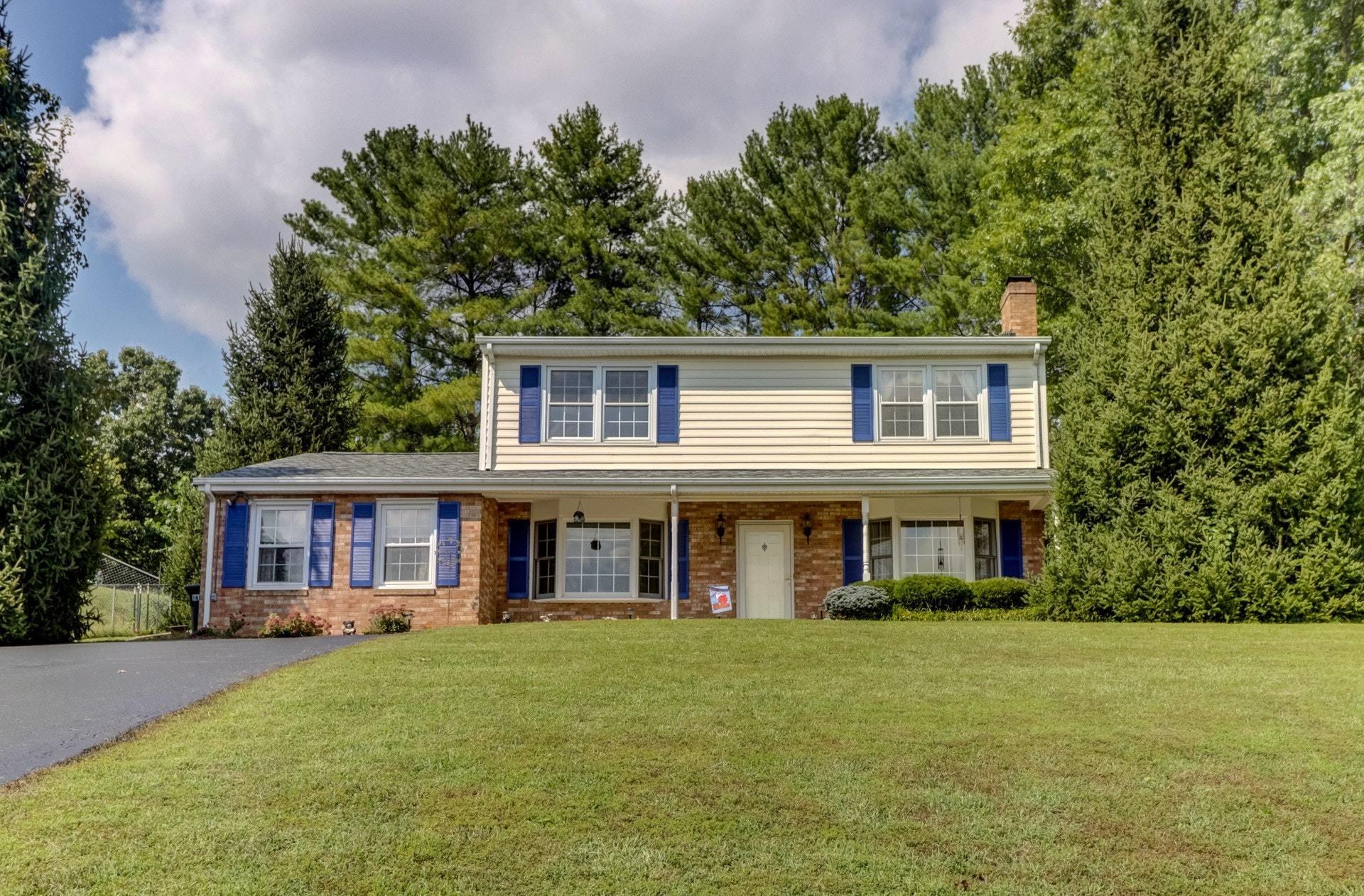 206 Ridgeview Road Blue Ridge, VA 24064 - Photo 3 of 44 a front view of a house with a garden