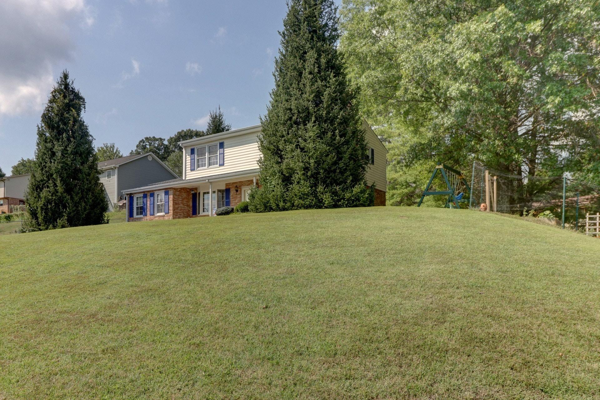 206 Ridgeview Road Blue Ridge, VA 24064 - Photo 38 of 44 a front view of a house with a yard