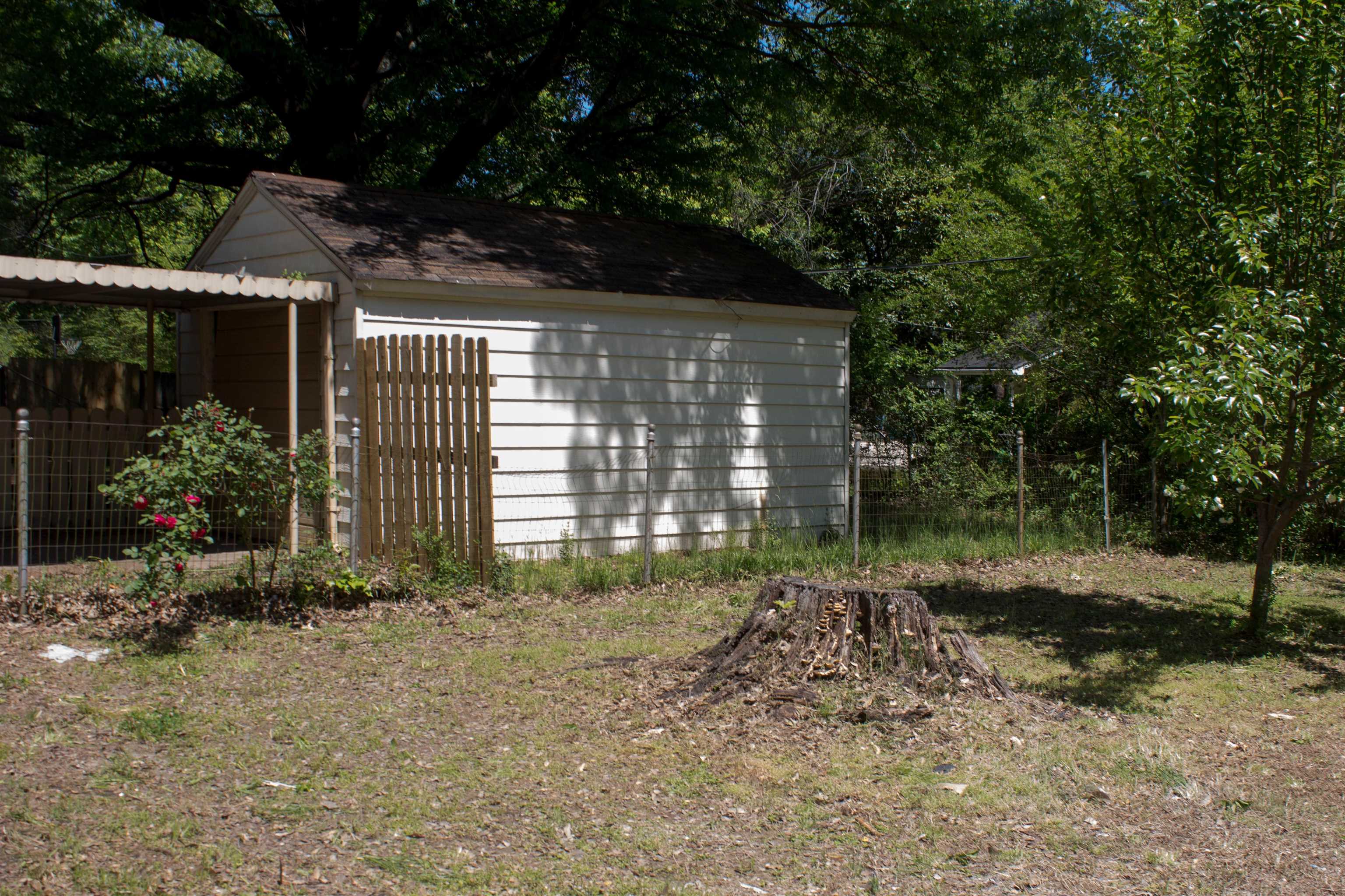 1058 Prescott Road Memphis, TN 38111 - Photo 12 of 16 a view of a house with a garden