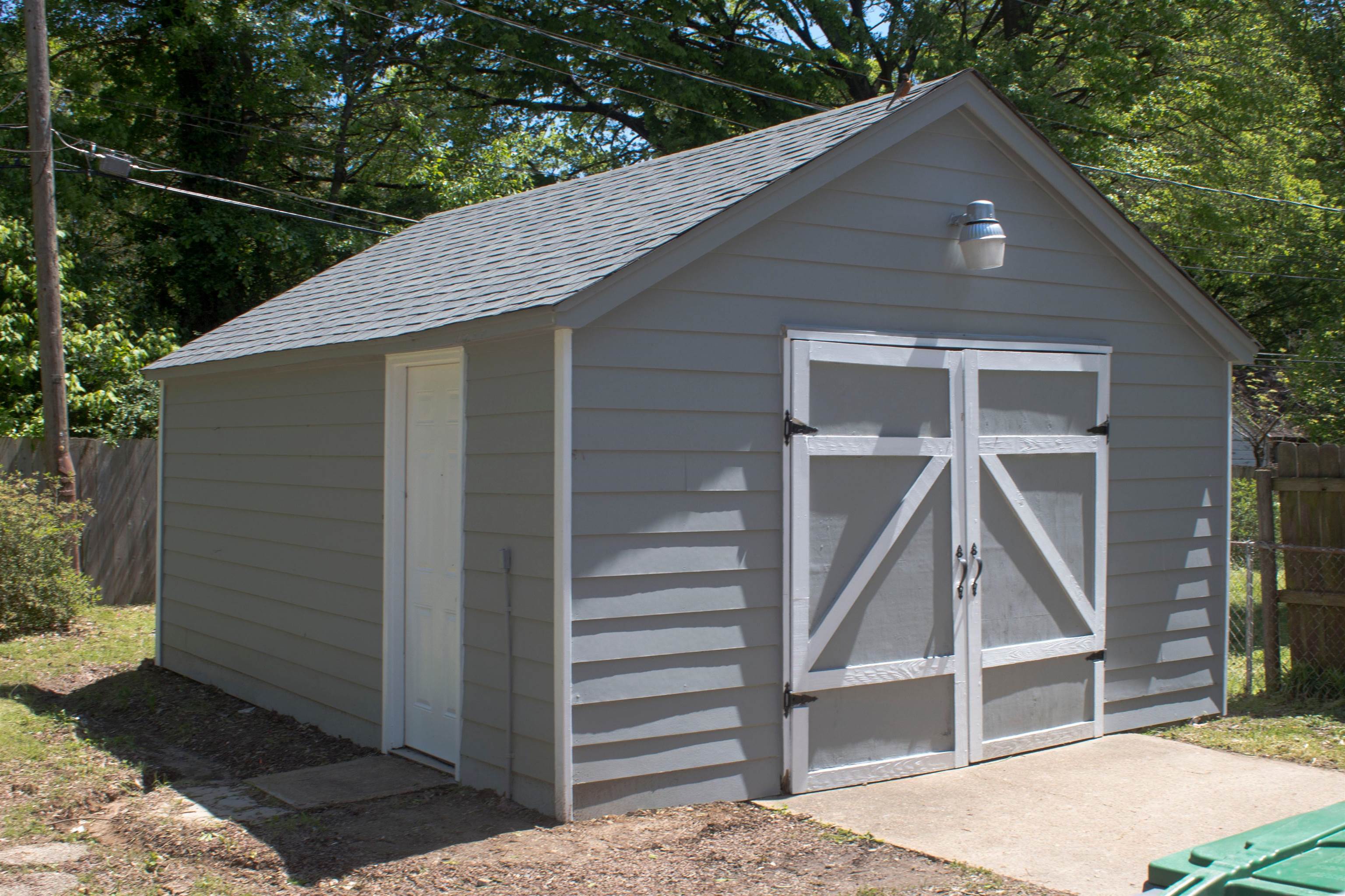 1058 Prescott Road Memphis, TN 38111 - Photo 13 of 16 a front view of a house with a yard