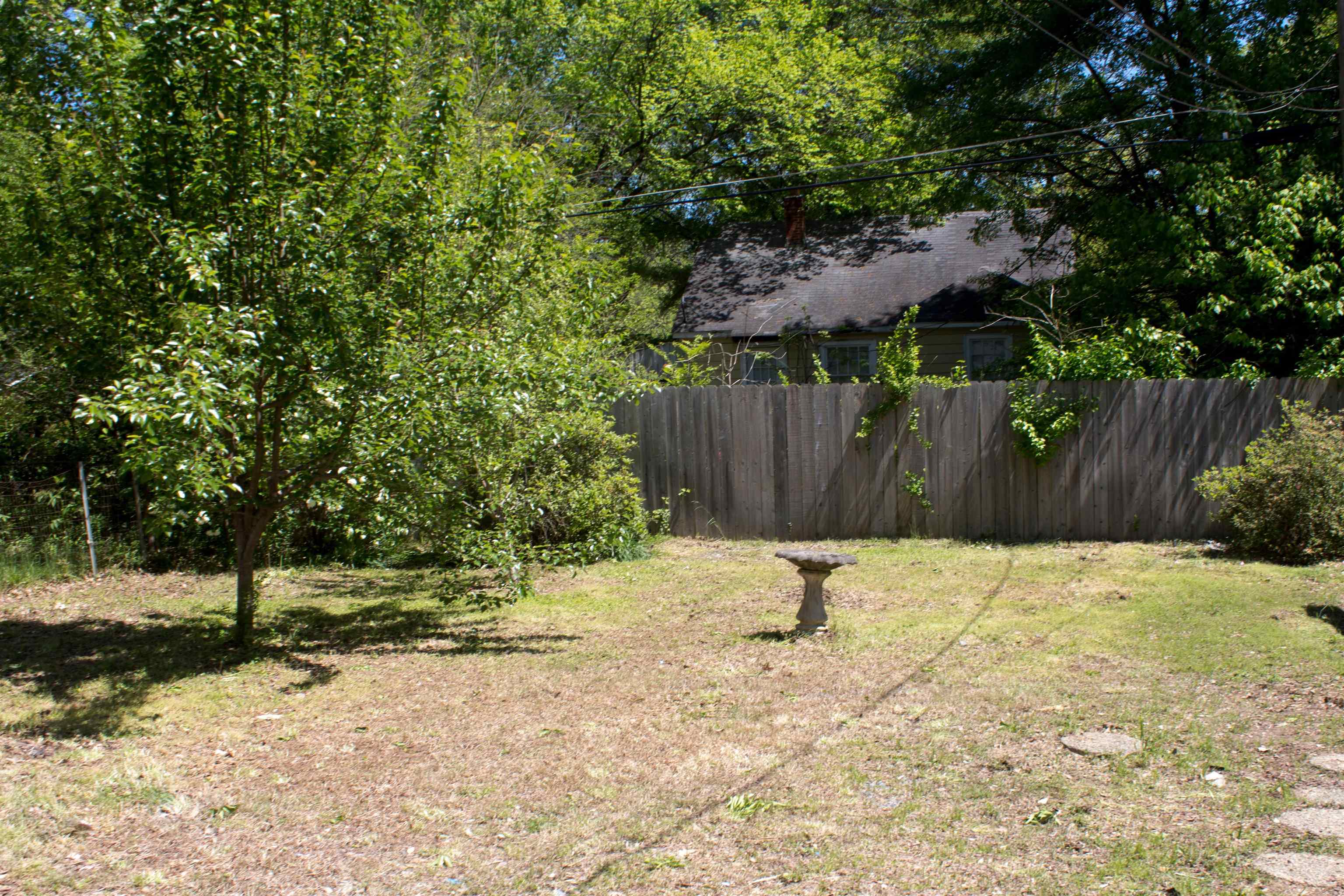1058 Prescott Road Memphis, TN 38111 - Photo 16 of 16 a backyard of a house