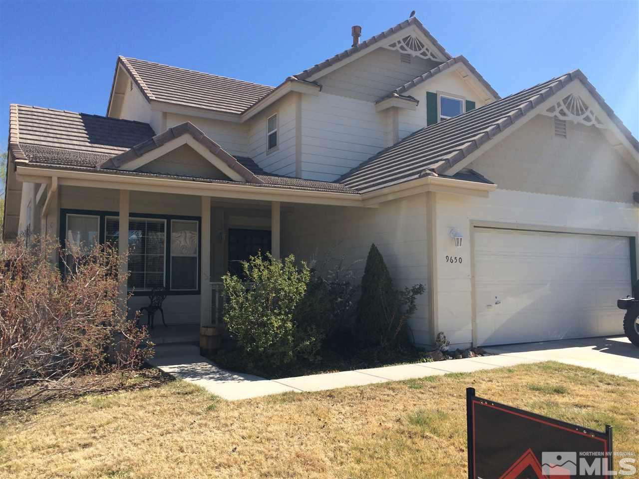 9650 Comanche Moon Drive Reno, NV 89521 - Photo 1 of 1 a view of house with wooden fence