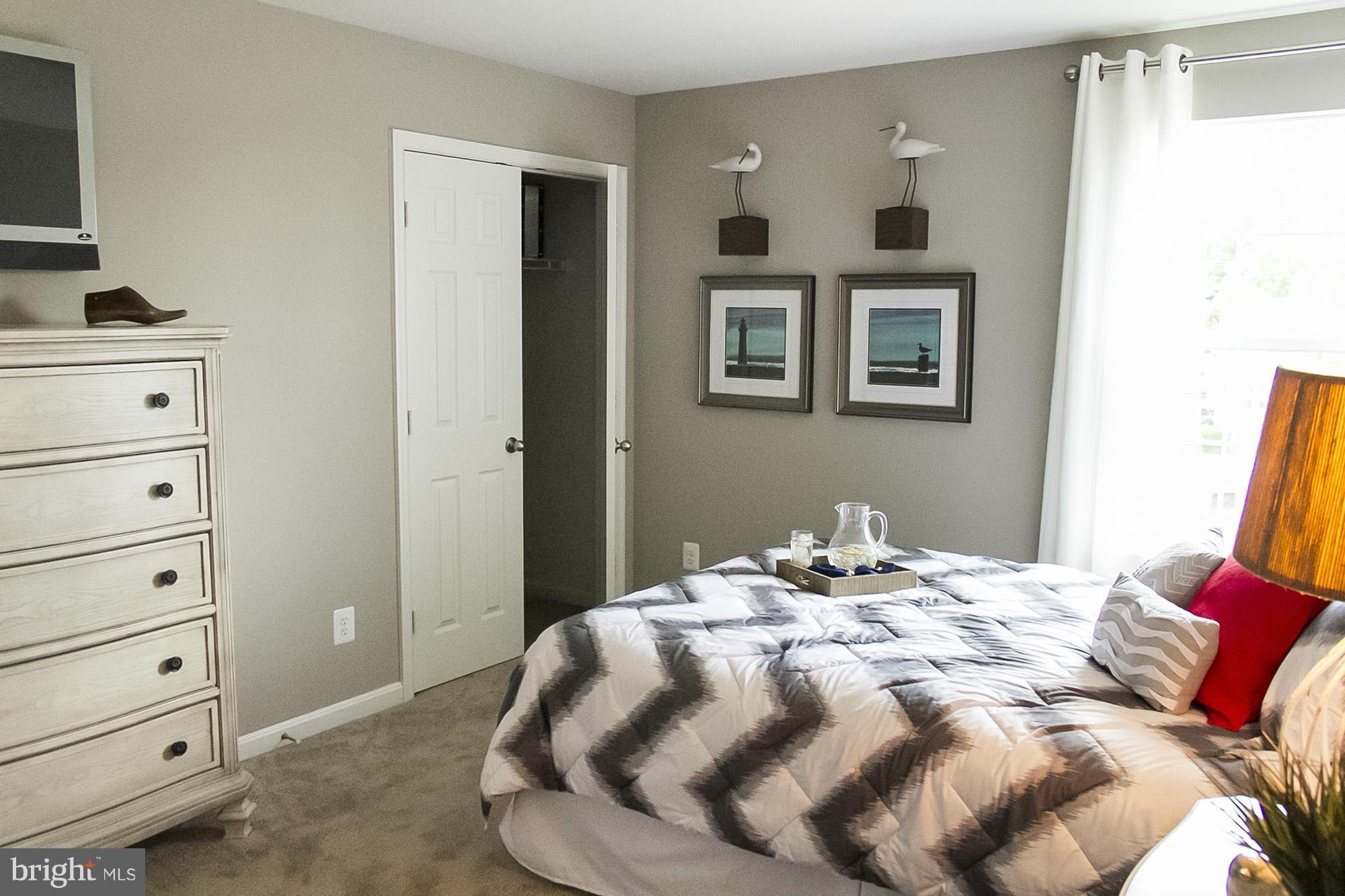 2537 Easy Street Fallston, MD 21047 - Photo 10 of 19 a bedroom with a bed and a flat tv screen