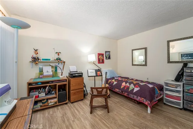 a bathroom with a sink toilet vanity and shower