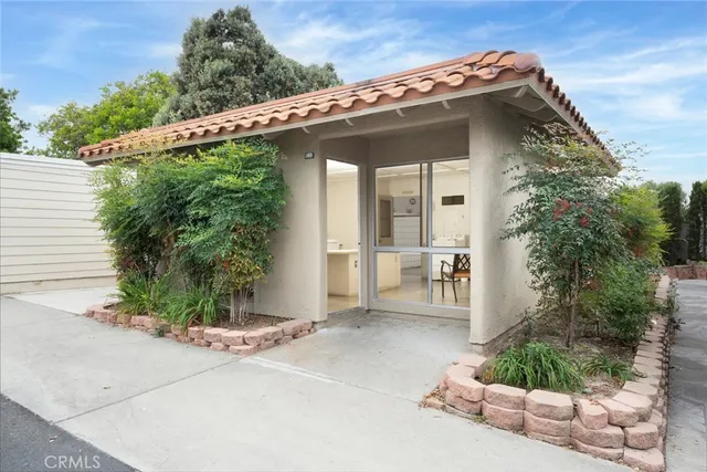 an aerial view of residential house with outdoor space