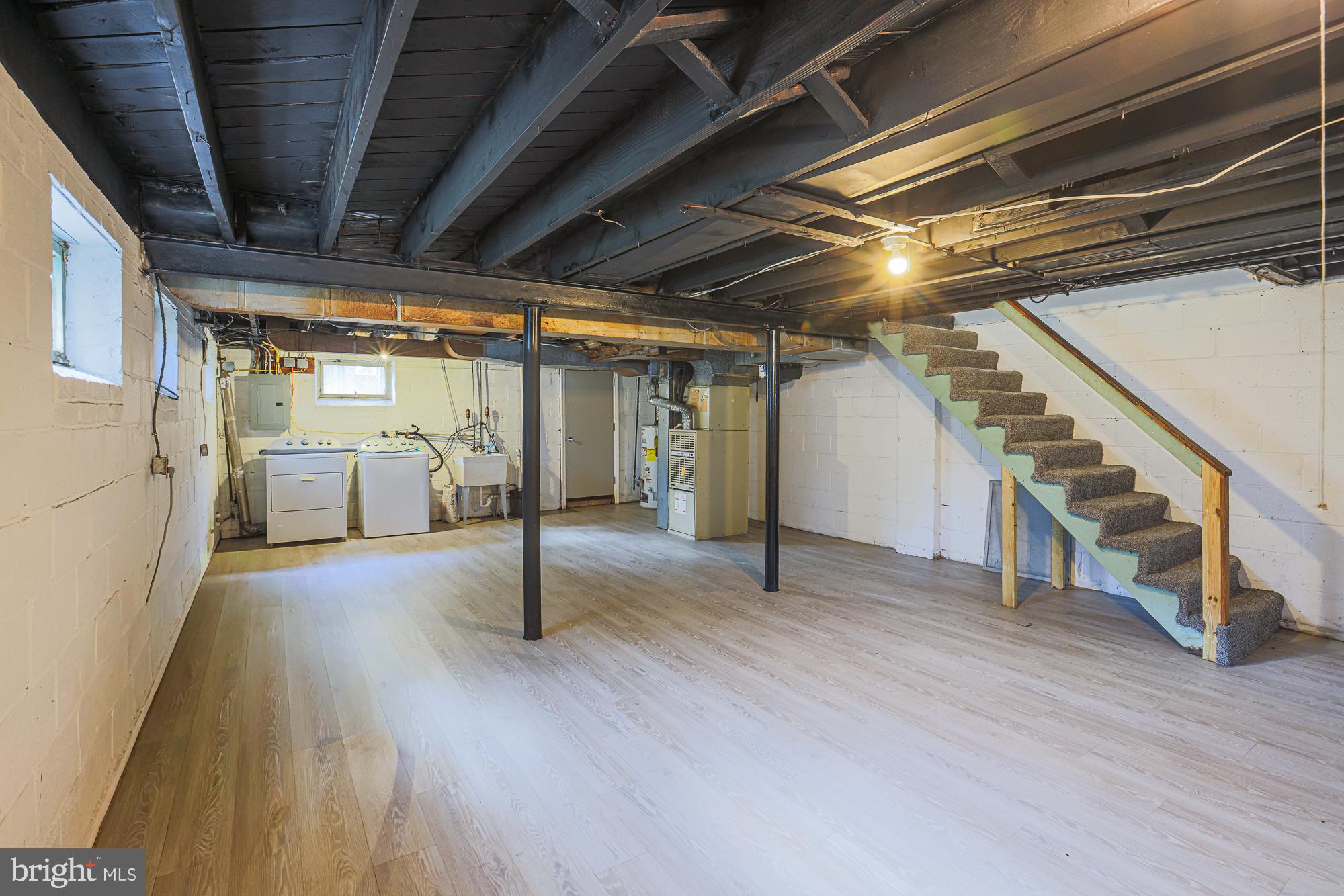 3914 Bancroft Road Baltimore, MD 21215 - Photo 17 of 25 a view of empty room with wooden floor
