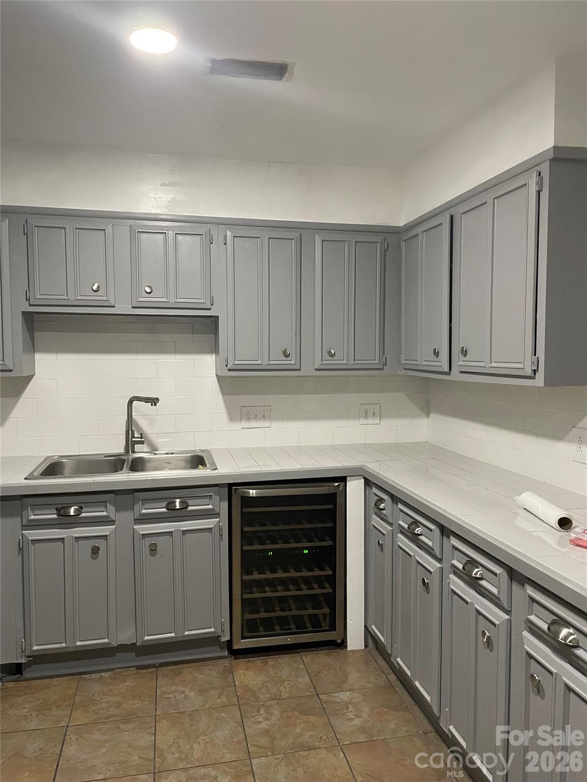 24016 Tidal Way Fort Mill, SC 29708 - Photo 2 of 9 a kitchen with a sink and cabinets