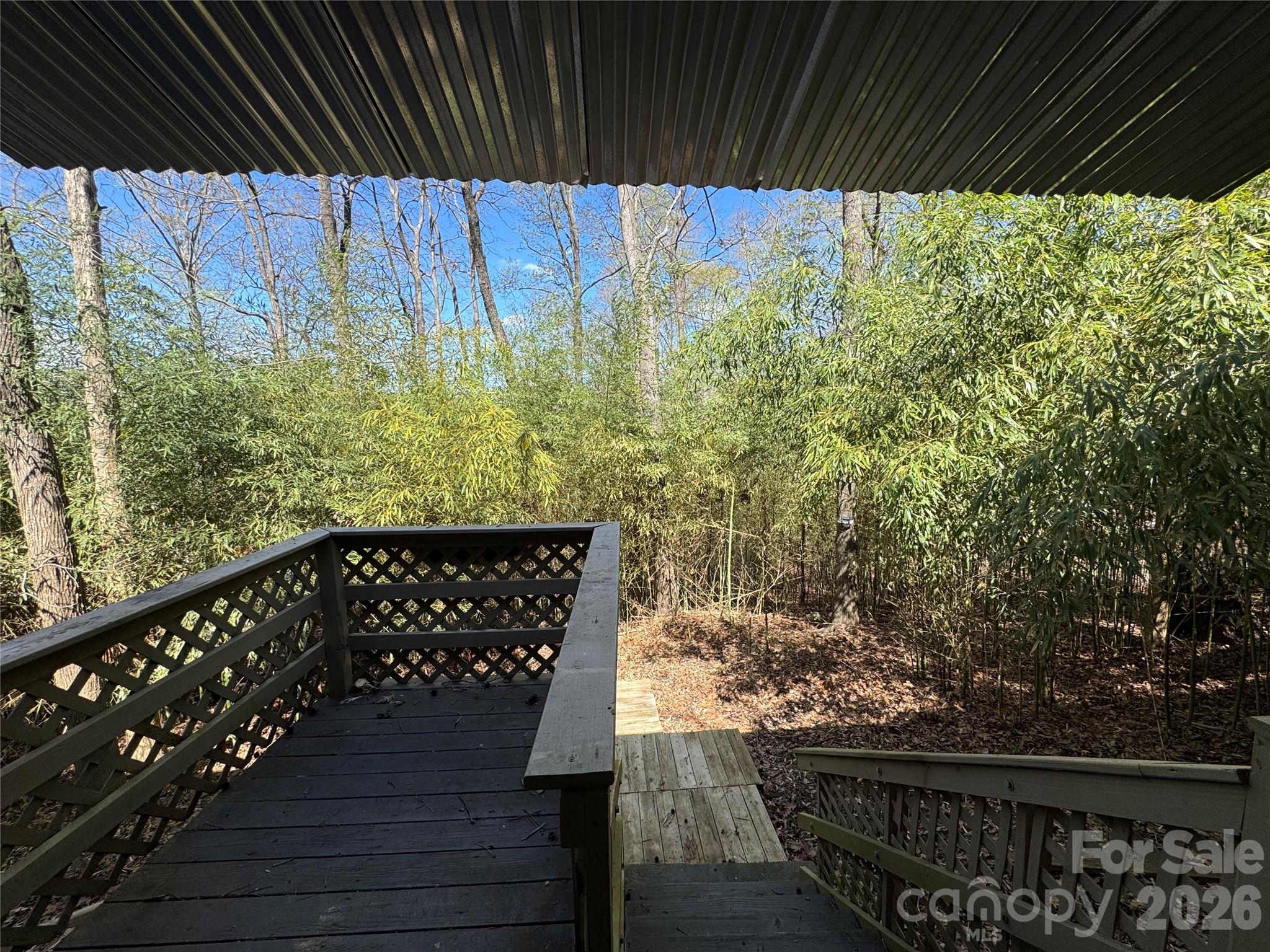 24016 Tidal Way Fort Mill, SC 29708 - Photo 9 of 9 a wooden bench sitting in front of a building