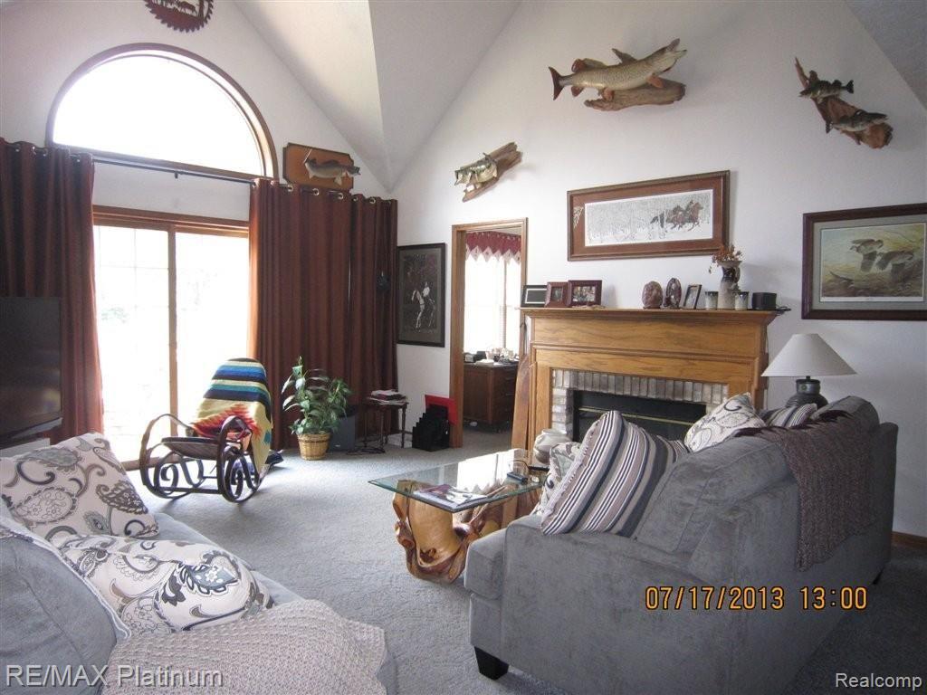 4203 North Latson Road Howell, MI 48855 - Photo 3 of 34 LATSON RD LIVING ROOM