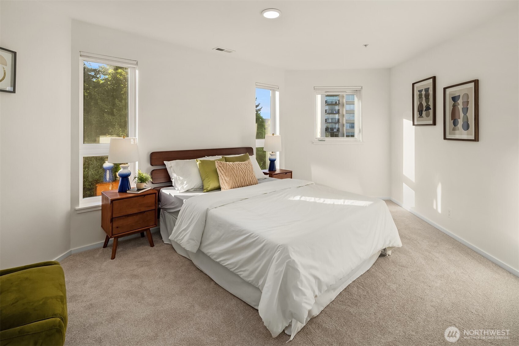 4528 8th Avenue Northeast, Unit 5A Seattle, WA 98105 - Photo 13 of 27 a bedroom with a bed and a couch