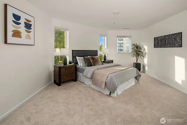 a bed room with furniture and a window