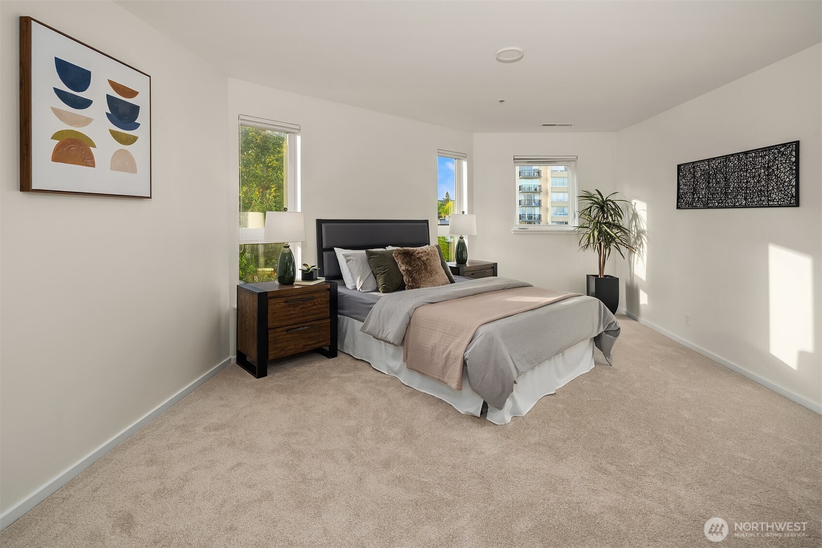 4528 8th Avenue Northeast, Unit 5A Seattle, WA 98105 - Photo 14 of 27 a bed room with furniture and a window