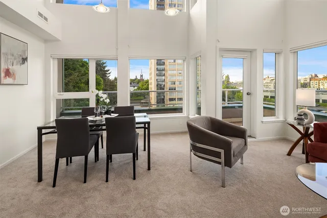 a view of a livingroom with furniture window and outside view