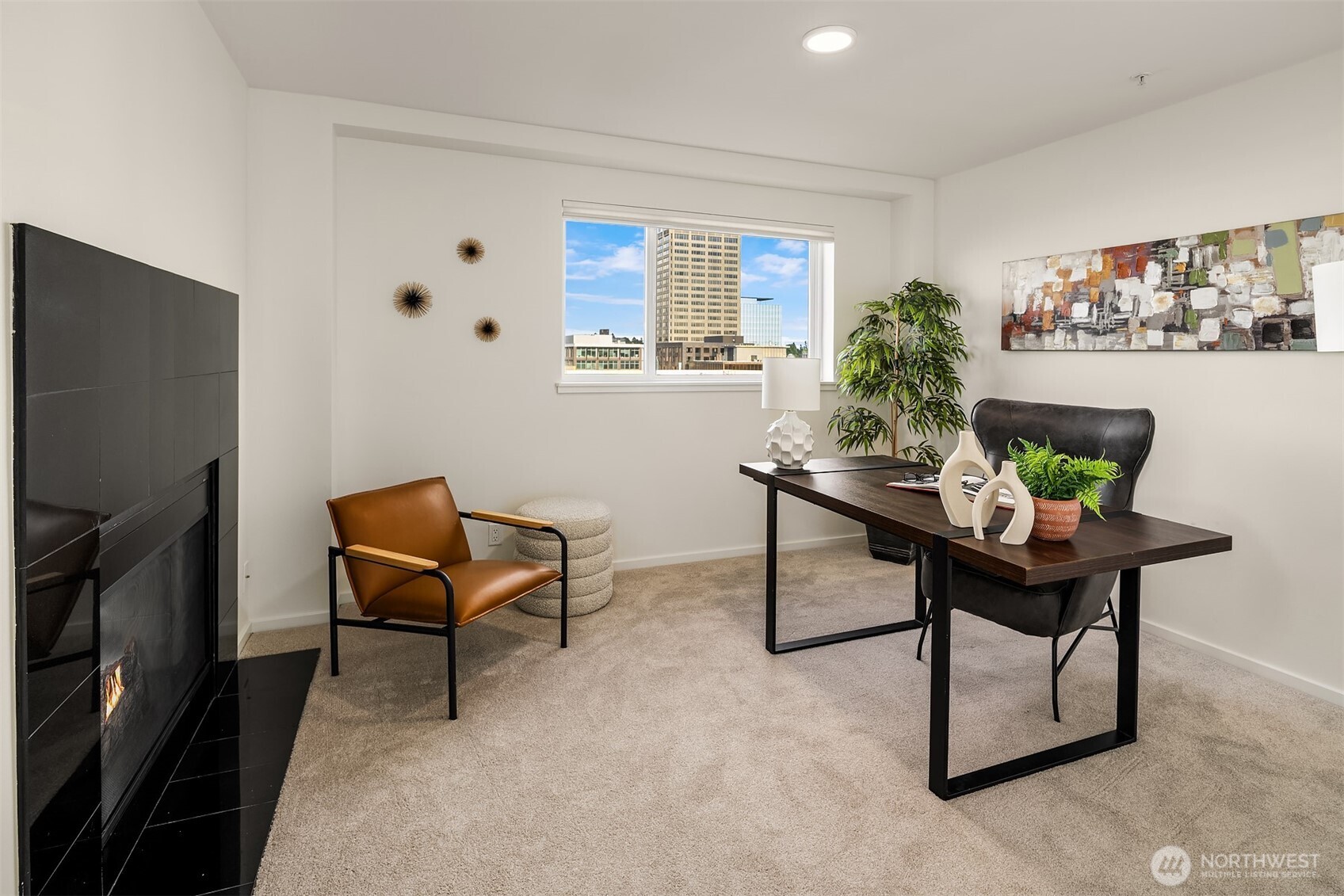4528 8th Avenue Northeast, Unit 5A Seattle, WA 98105 - Photo 9 of 27 a room with furniture and a potted plant