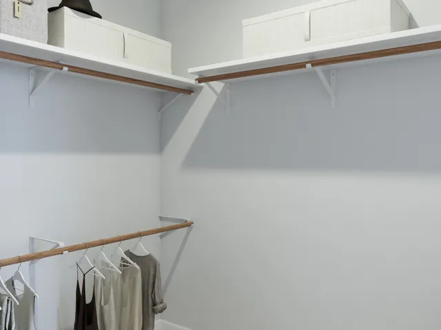 a bathroom with a shower and a bath tub