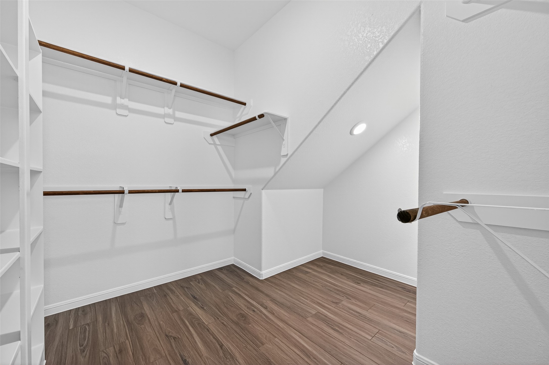 9259 Grace Rdg Drive Willis, TX 77318 - Photo 18 of 39 a view of a room with wooden floor