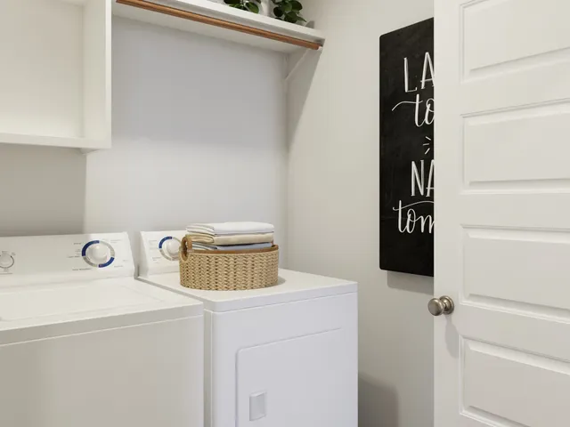 a bedroom with a bed and a mirror