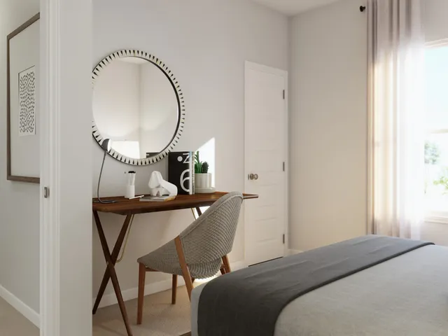 a living room with furniture chess board and a window