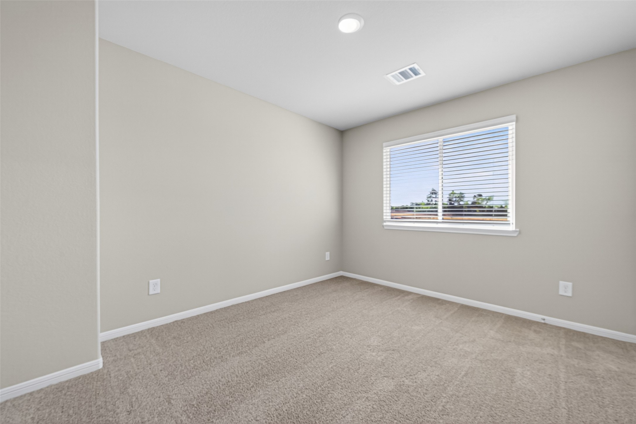 9259 Grace Rdg Drive Willis, TX 77318 - Photo 26 of 39 a view of an empty room with a window