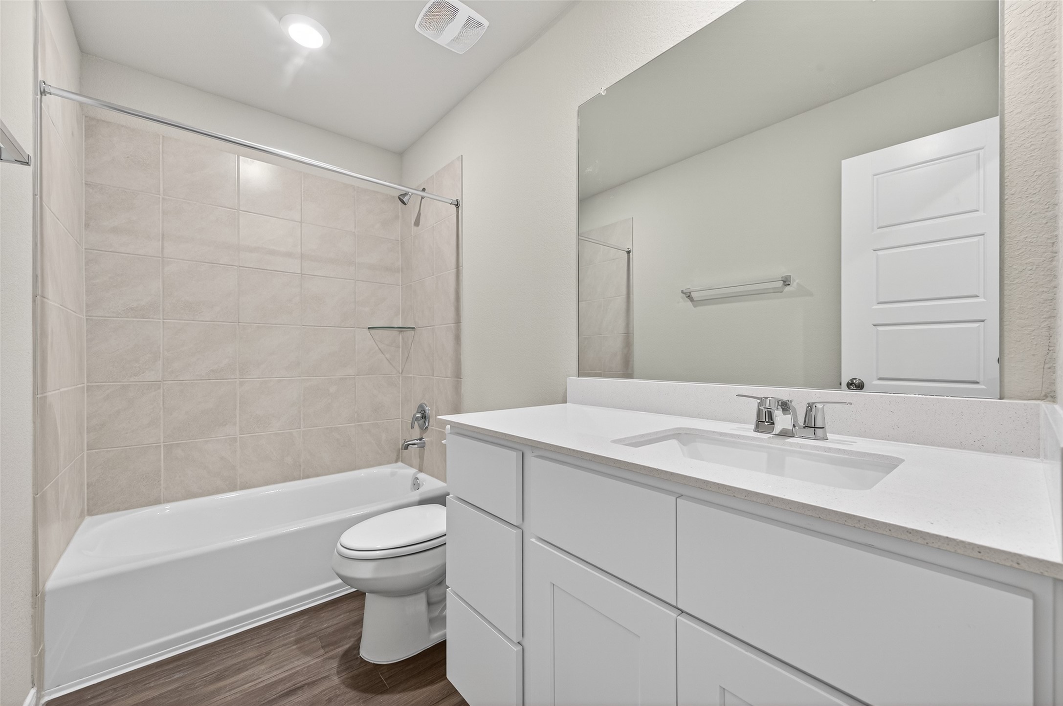 9259 Grace Rdg Drive Willis, TX 77318 - Photo 28 of 39 a bathroom with a granite countertop sink toilet a large mirror and shower