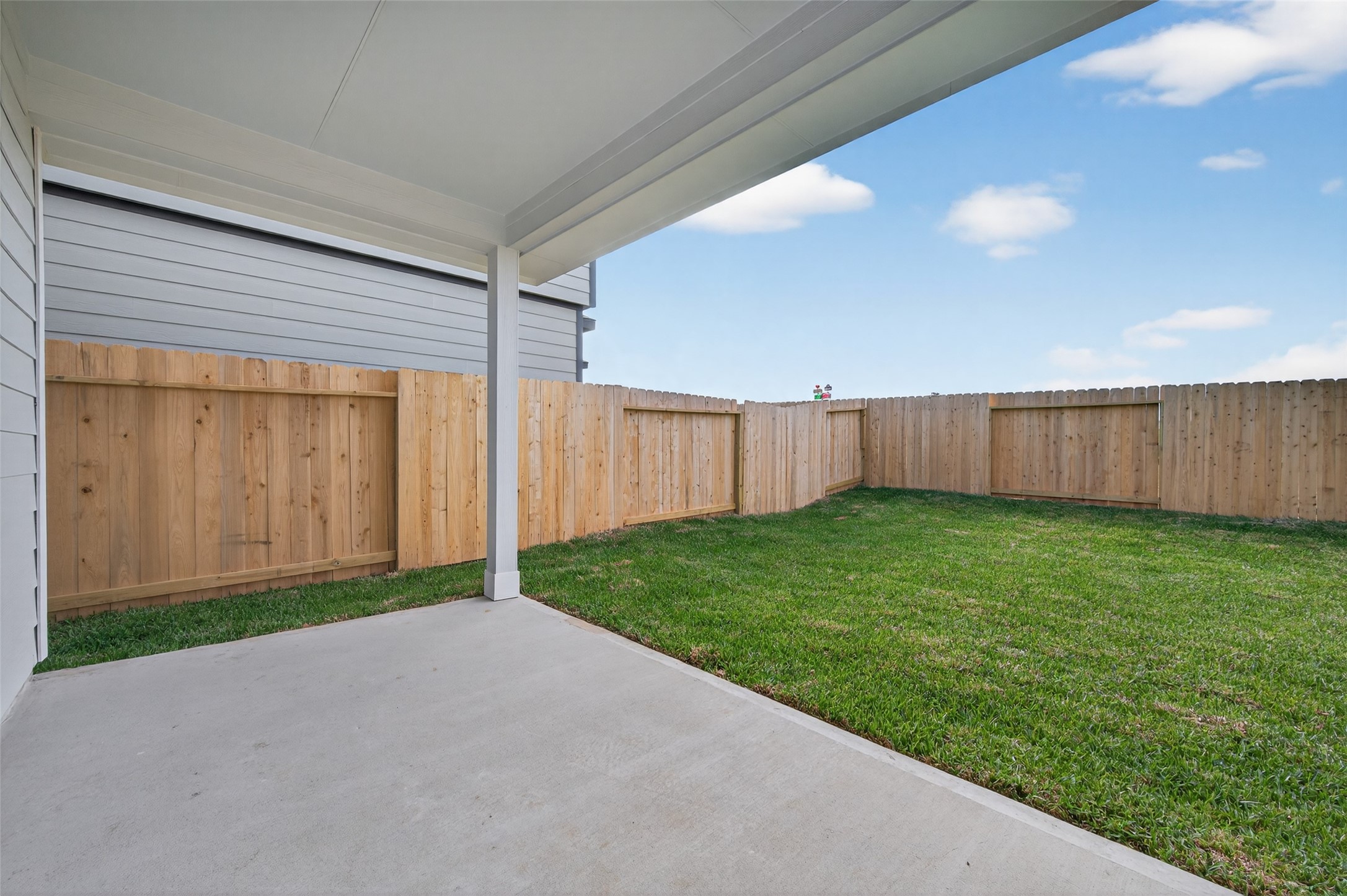 9259 Grace Rdg Drive Willis, TX 77318 - Photo 32 of 39 a view of a backyard with hardwood