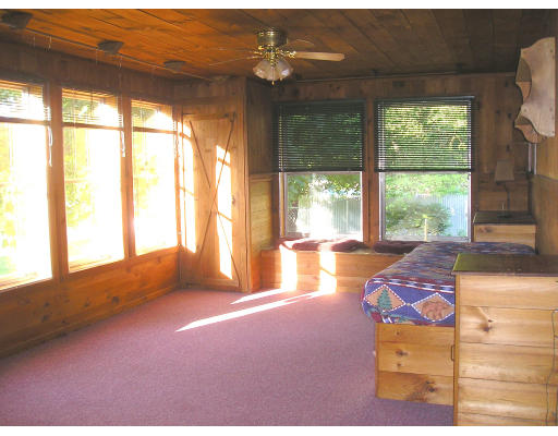 332 Bolton Road Lancaster, MA 01523 - Photo 10 of 13 a view of an empty room with a window