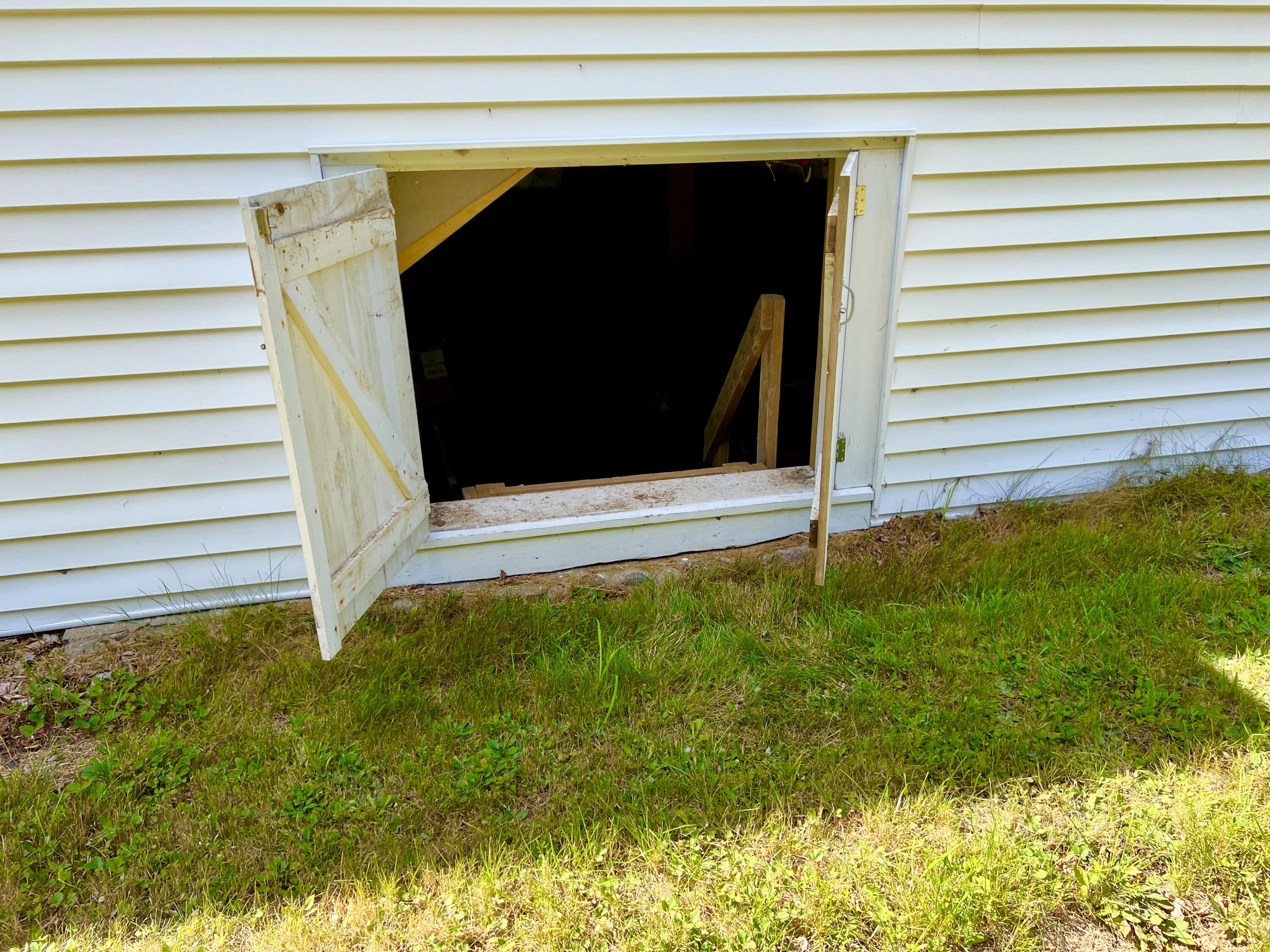 658 Tremont Road Tremont, ME 04612 - Photo 7 of 42 Basement access on left side of building