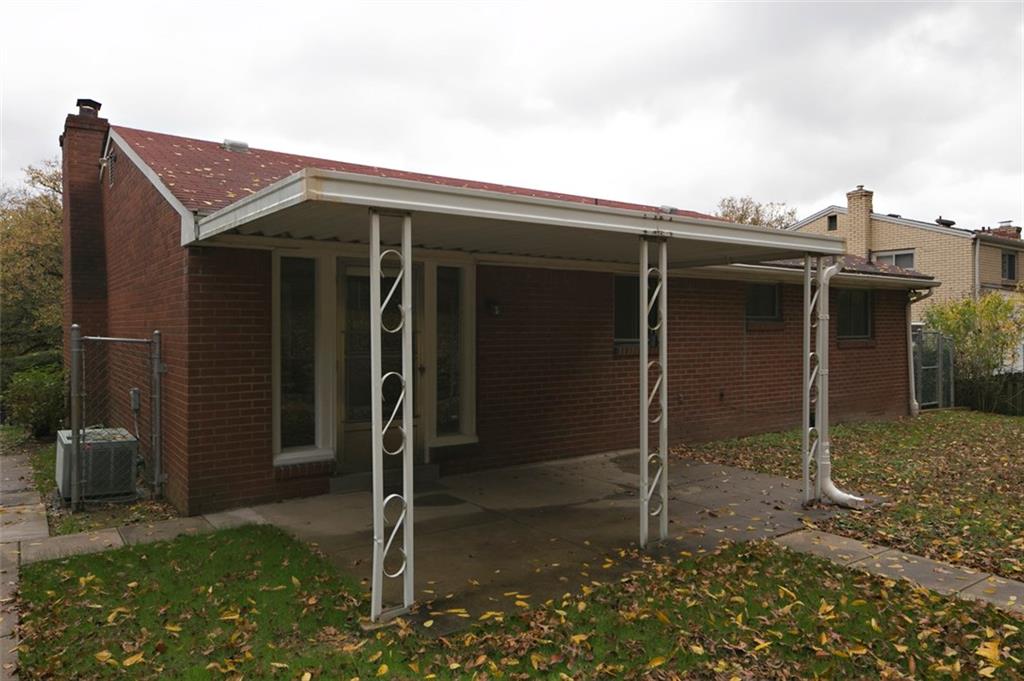 112 Washington Road Forest Hills, PA 15221 - Photo 5 of 24 Back Covered Patio Showing Fenced Yard
