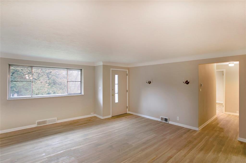 112 Washington Road Forest Hills, PA 15221 - Photo 10 of 24 Front Entry in Living Room Showing Access Back to Three Bedrooms and Two Baths