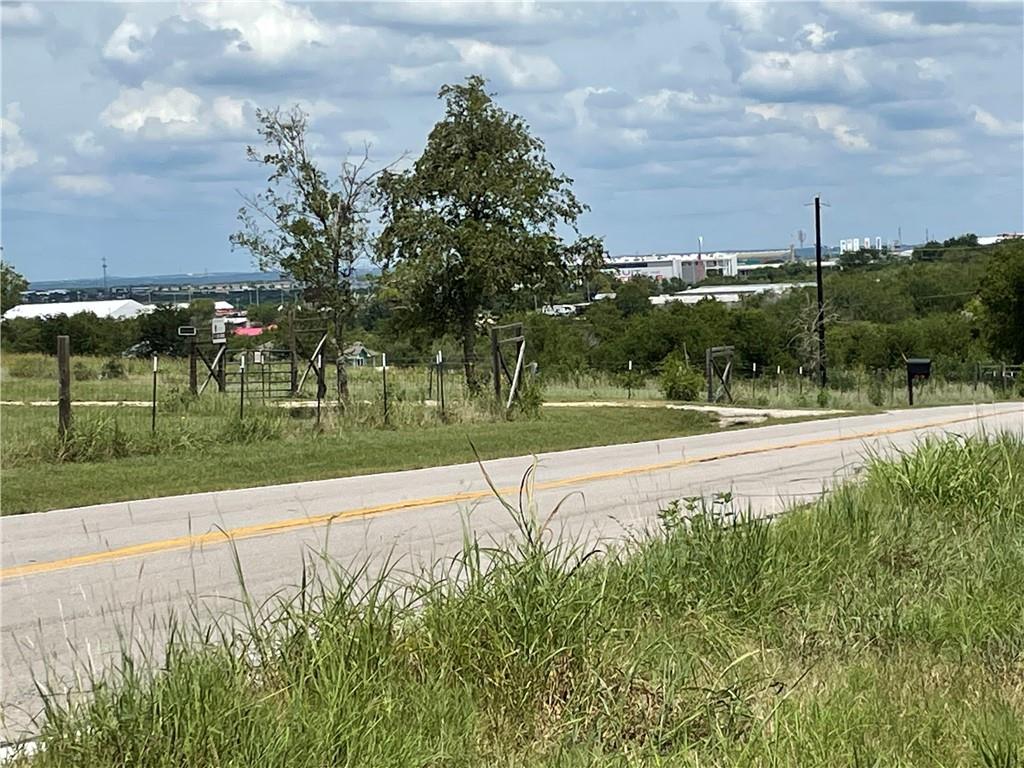 9025 Burklund Farms Road Del Valle, TX 78617 - Photo 2 of 14 View of asphalt street