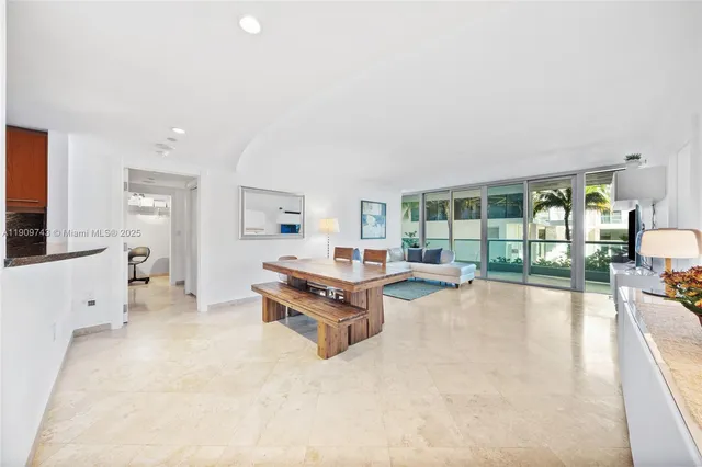 a living room with furniture and a table