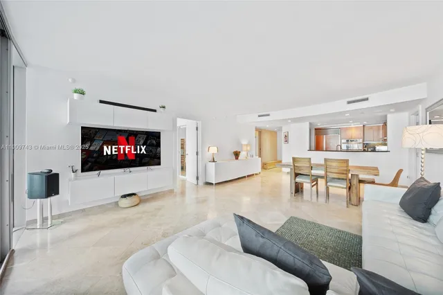 a bedroom with a bed and a lamp