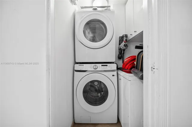 a view of a hallway with seating area
