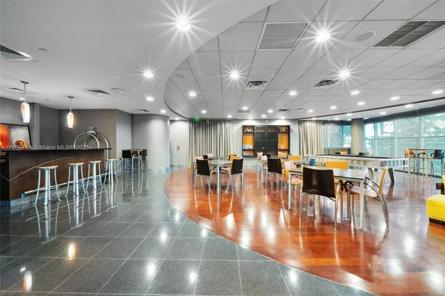 a view of a wooden deck with a yard