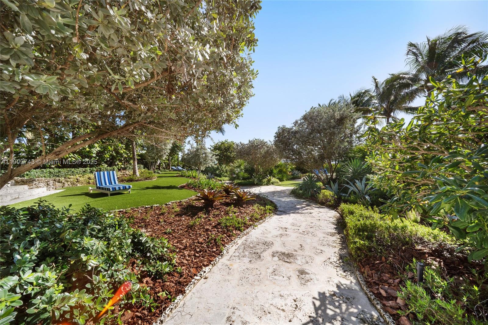 9401 Collins Avenue, Unit 205 Surfside, FL 33154 - Photo 34 of 36 a view of a park with large trees