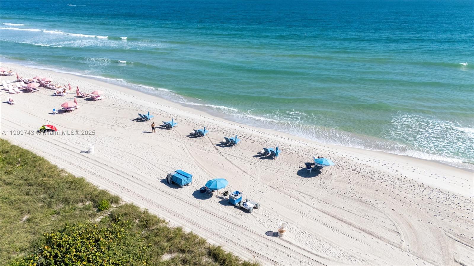 9401 Collins Avenue, Unit 205 Surfside, FL 33154 - Photo 7 of 36 a bathroom with a tub sink and view of living room
