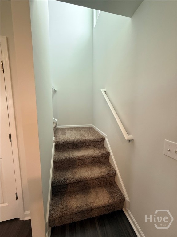 1244 Wilkins Road Midway, GA 31320 - Photo 26 of 58 Stairwell leading to floor 2