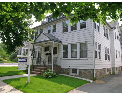 33 Kirkwood Road Boston, MA 02135 - Photo 1 of 1 a front view of a house with a yard