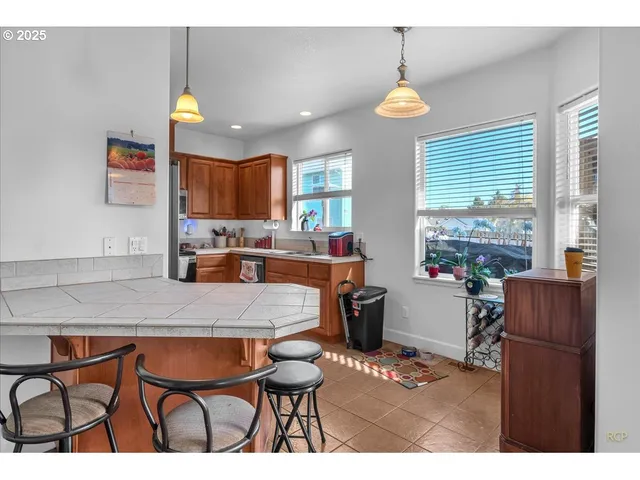 a view of livingroom with furniture and a flat screen tv