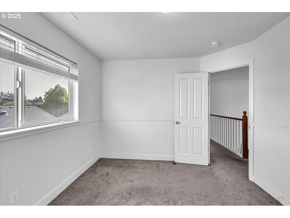 59174 Whitetail Avenue St. Helens, OR 97051 - Photo 21 of 34 a view of empty room with window