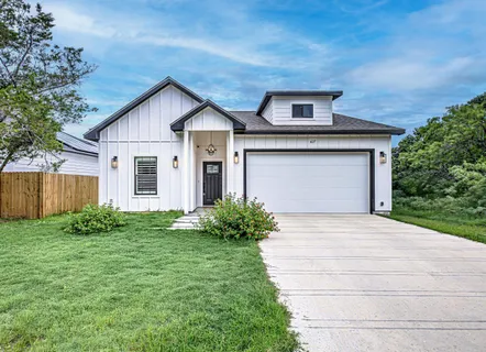 a front view of house with yard