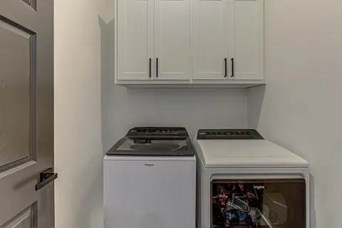 a front view of house with yard and seating area