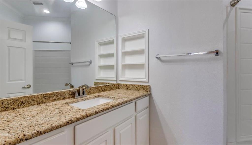 727 Scenic Ranch Circle Fairview, TX 75069 - Photo 7 of 11 Granite counter guest bath